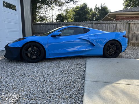 Blue Corvette with clear factory side glass before tinting